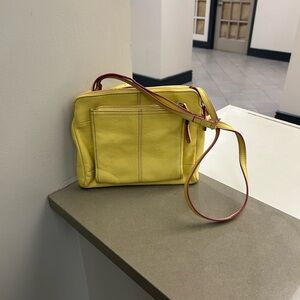 Tignanello Chic Yellow Leather Crossbody Bag with Timeless Design -very clean!